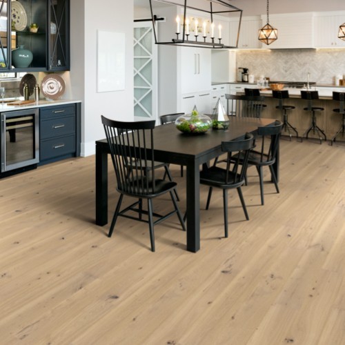 Natural wood hardwood floors in kitchen and dining room | Jordan's Flooring