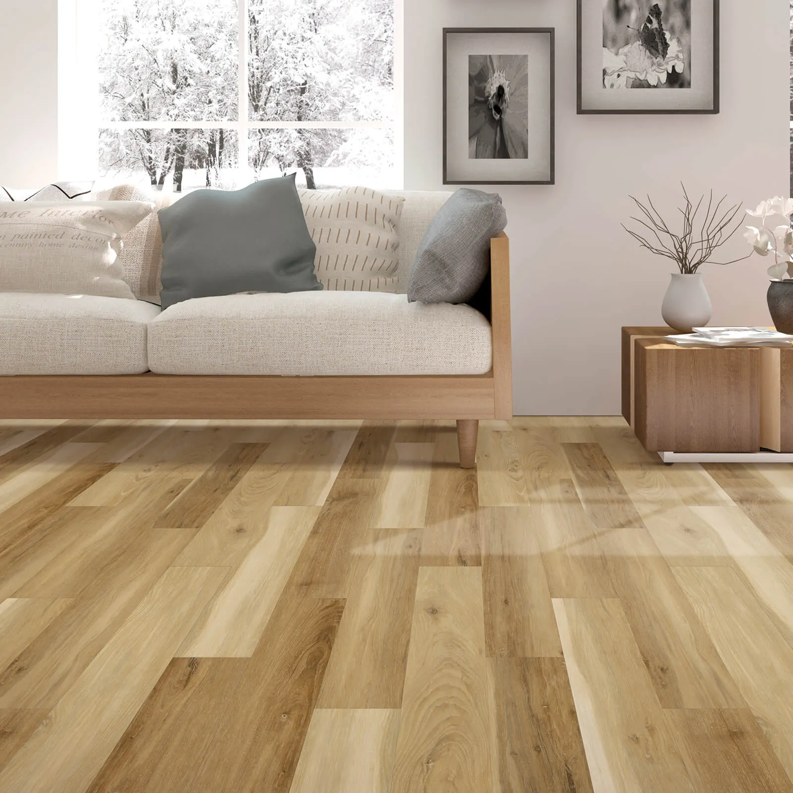 Multi-tonal, natural plank laminate flooring in a contemporary living room featuring a cream-colored sofa and a large window.